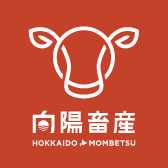 向陽畜産のロゴ